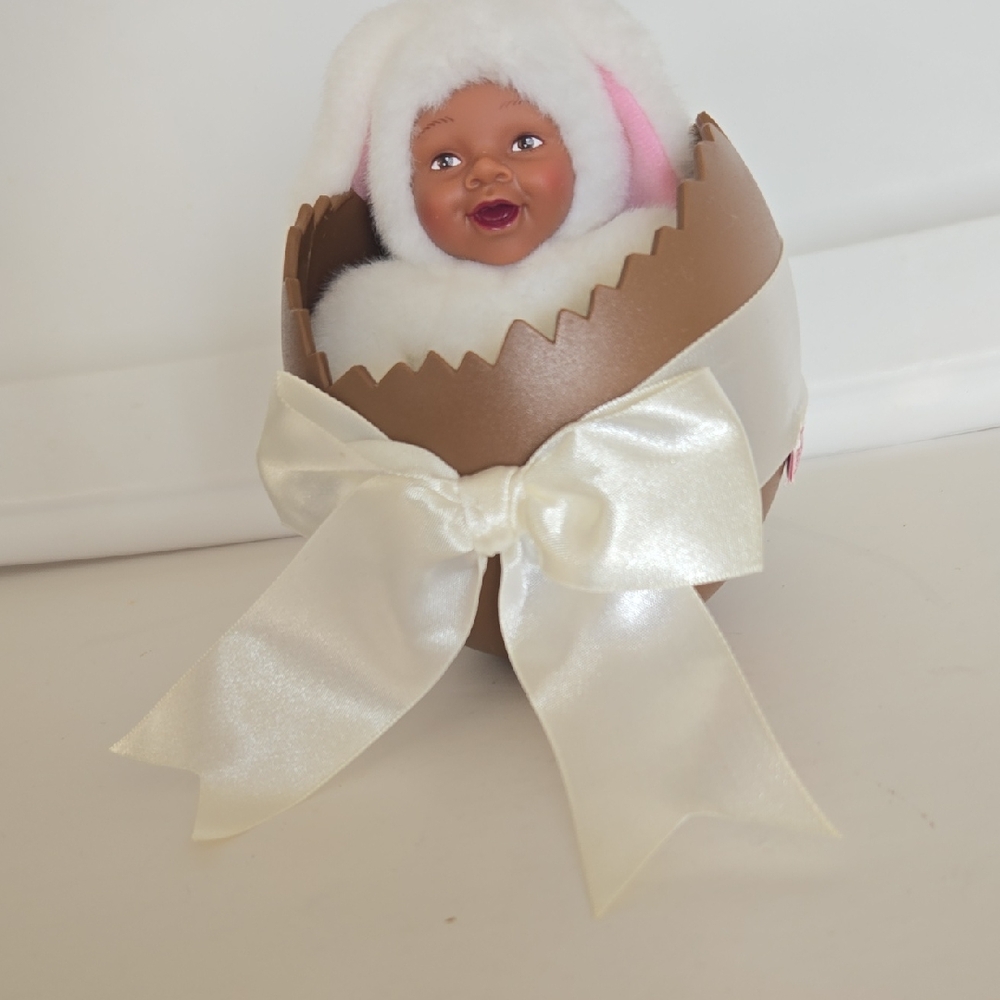 Adorable Baby Doll in Egg with Bow by Anne Geddes